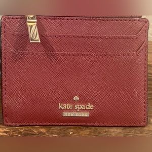 Kate Spade top zip card holder with key ring. Burgundy gently used in good cond